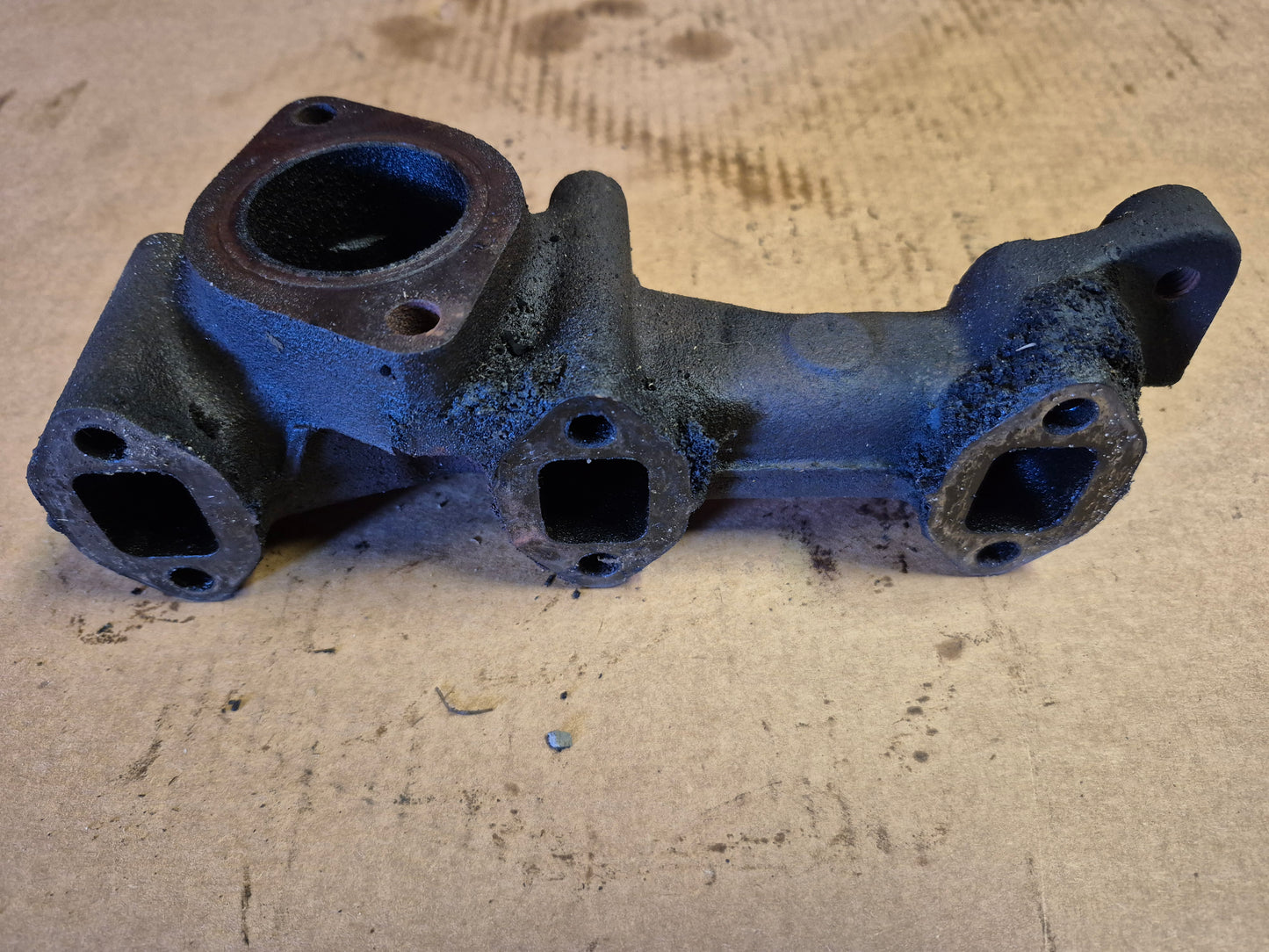 Exhaust Manifold M805230 John Deere 3215B